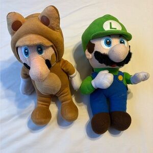 Super Mario Tanooki Raccoon Mario plush and a Regular Luigi plush both 12”